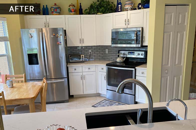 Kitchen remodel, white cabinets with grey subway title