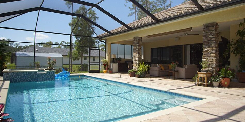 View of pool after patio remodel by Spec Development